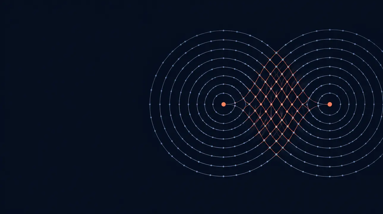 An abstract dark navy graphic: two sets of pale rings spread from two coral points on the right and overlap in a coral weave between them.
